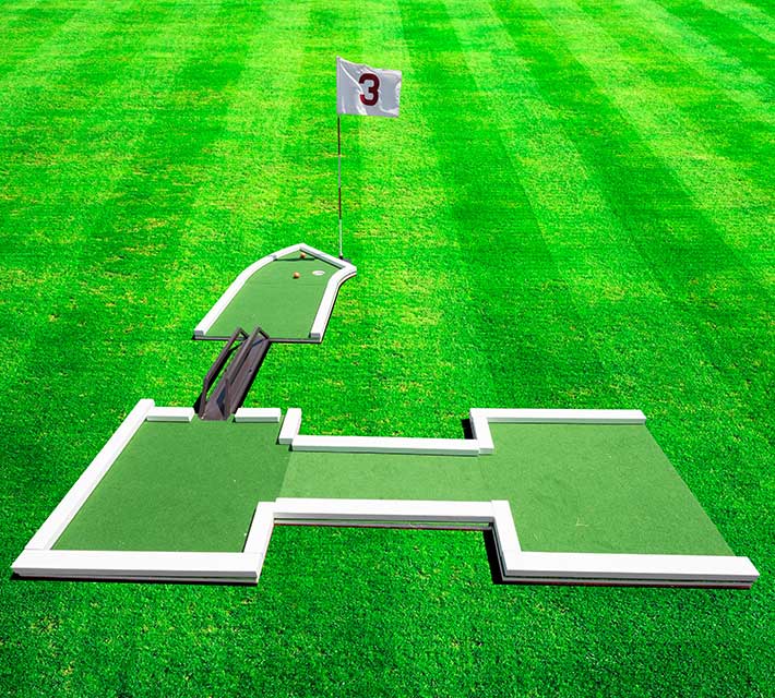 9 hole wedding putt putt rental with bride & groom image